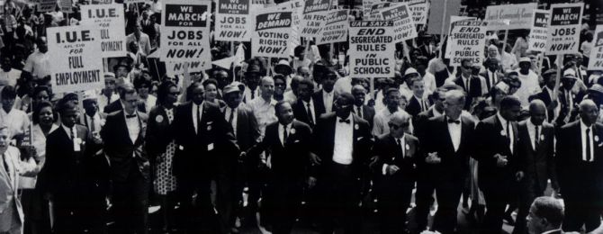 The leaders of the March on Washington lock arms as they lead the way along Constitution Avenue in this August 28,1963 photo. The march gave immense impetus to the nation's civil rights movement and led to the passage of important new laws aimed at aiding black Americans. The Rev. Martin Luther King, Jr. is at center, seventh from right. At extreme right is A. Philip Randolph, the march director. Alongside Randolph is Roy Wilkins, executive secretary of the NAACP.