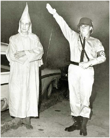 Clarence Brandenburg, a Ku Klux Klan leader, and Richard Hanna, a member of the American Nazi Party, following their arrests for advocating violence against minority groups in Cincinnati, Ohio, August 8, 1964.