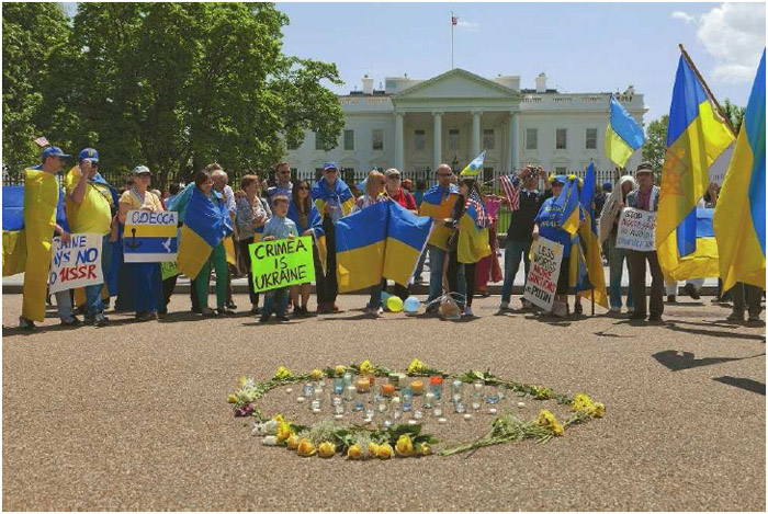 Ukrainian Americans gather in front of the White House, urging President Obama to take tougher action against Putin's involvement of Russia in the Ukraine, Washington, DC, May 2014.