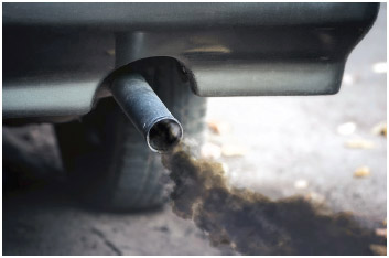 Smoke from old, dirty car pipe exhaust.
