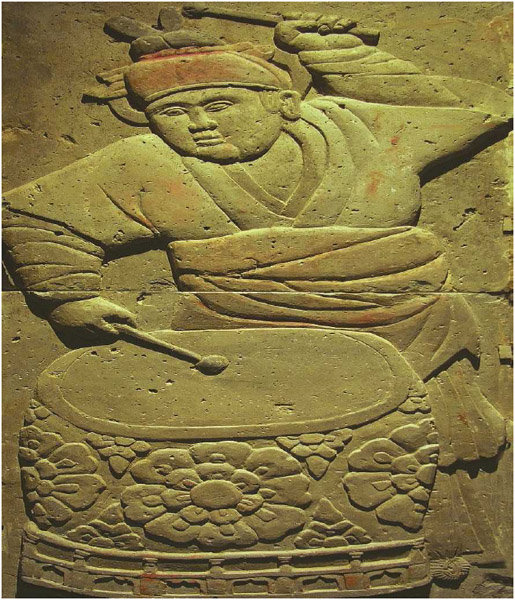 This stele depicts a musician from the Tang dynasty. Several types of Chinese music had developed by the time of the Tang dynasty.