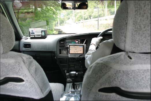 A Kyoto taxi cab equipped with GPS navigation system.