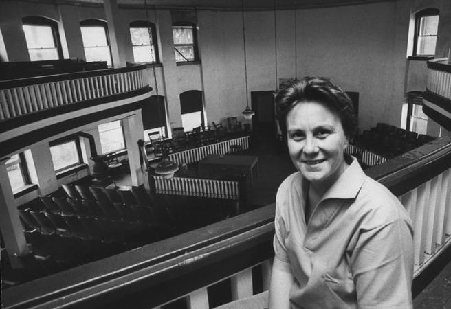 Harper Lee, author of To Kill a Mockingbird, visits the courthouse of her hometown of Monroeville, Alabama, in 1965. In the acclaimed novel, Lee used Monroeville as the model for the fictional town of Maycomb.