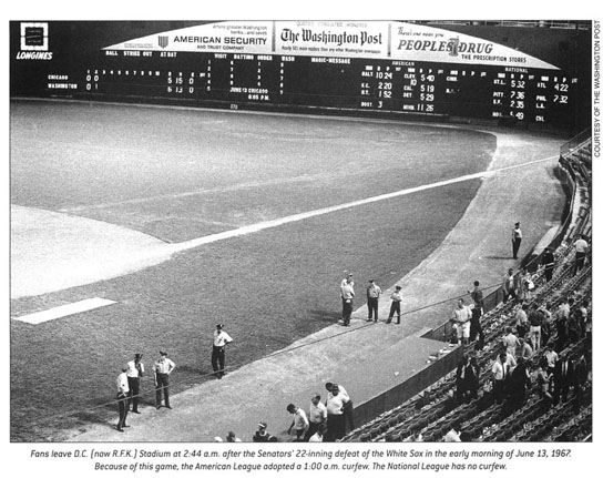 Yankee catcher Yogi Berra faces off with umpire Ed Rommel during the  seventh inning of Game 3 of the World Series at Ebbets Field in the  Brooklyn borough of New York City