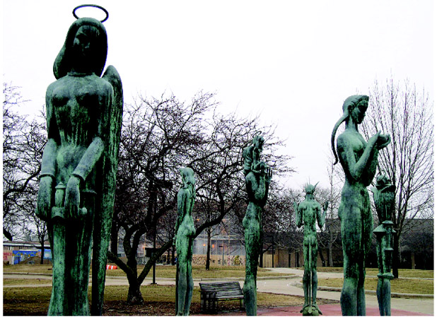 The Saints and Sinners sculpture on the Oakland University campus in Michigan shows signs of streaking due to acid rain. Made of bronze, the artwork is being corroded.  2003 Kelly A. Quin.