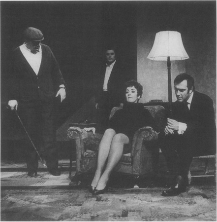 Ruth (Jane Lowe) is surrounded by her husbands family, (left to right) Max (John Savident), Joey (Terence Rigby), and Lenny (playwright Pinter taking a turn at acting)