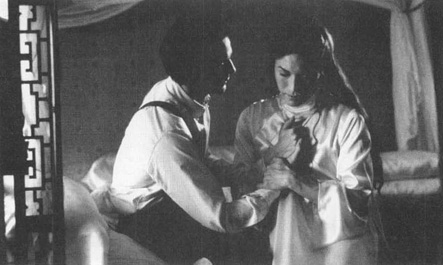 A scene from the 1993 film adaptation of M. Butterfly, starring Jeremy Irons (left) and John Lone