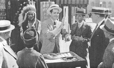 A scene from the 1939 film adaptation of Idiots Delight, featuring Clark Gable, as Henry Van