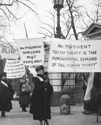 Suffragettes march in front of the White House in support of womens rights, representing the change in society that slowly lead to Claire Archers madness in The Verge