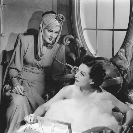 Rosalind Russell and Joan Crawford in the 1939 film The Women, written by Clare Boothe Luce