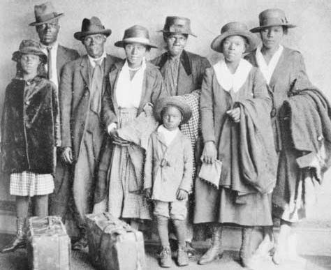 The Great Migration. A Negro Family arrives in Chicago from the rural South. The image is from The Negro in Chicago: A Study of Race Relations and a Race Riot (1922). PHOTOGRAPHS AND PRINTS DIVISION, SCHOMBURG CENTER FOR RESEARCH IN BLACK CULTU