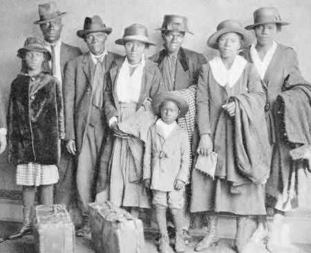 African American men, women, and children who have just arrived in Chicago with their suitcases, 1918. Between the years of 1910 and 1920 the black population exploded in Northern cities such as New York, Philadelphia, and Detroit and led to an