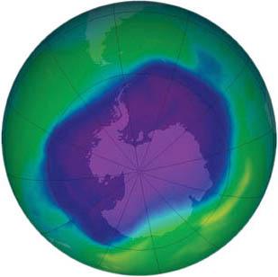 A September 2006 satellite image shows a 11.4-million square mile hole in the ozone; layer over the Antarctic. The blue and purple colors are where there is the least ozone; the greens, yellows, and reds are where there is more.