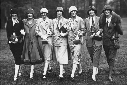 Narrower skirts to the knee and jackets with low waistlines gave women a new, tubular silhouette. Reproduced by permission of © Hulton-Deutsch Collection/CORBIS.