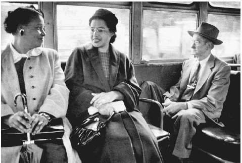 PRIMARY SOURCE: Montgomery Bus Boycott: Rosa Parks rides on a newly integrated bus in Montgomery, Alabama, following the end of the Montgomery Bus Boycott. December 26, 1956. PHOTO BY DON CRAVENSTIME LIFE PICTURESGETTY IMAGES.