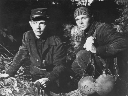 Bill Mauldin as Tom Wilson and Audie Murphy as Henry Fleming in the 1951 film version of The Red Badge of Courage 