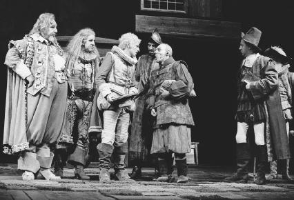 Brewster Mason as Sir John Falstaff, Richard Moore as Master Ford, Ben Kingsley as Slender, Tim Wylton as Bardolph and Emrys James as Evans in Act I, scene I at the Royal Shakespeare Theatre, 1975