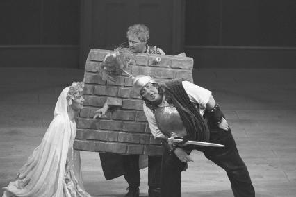 Daniel Evans as Francis FluteThisby, Howard Crossley as Tom SnoutWall, and Desmond Barrit as BottomPyramus in Act V, scene i, at the Barbican Theatre, 1995