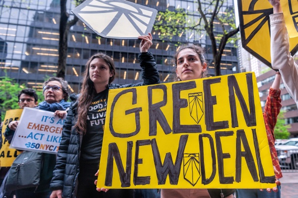 A climate activist group rallied in front of Senator Chuck Schumer's office in Midtown Manhattan demanding that he sign the New Green Deal on April 30, 2019.