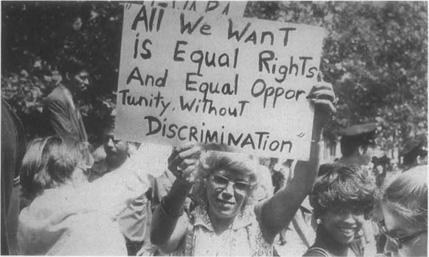 Women rally in support of the Equal Rights Amendment. The issue of equality is the central theme in Harrison Bergeron.