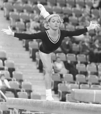 American Cathy Rigby performs during the compulsory gymnastic team competition at the 1972 Munich Olympics. That year, the Los Angeles Times named her Sportswoman of the Year. Reproduced by permission of AP/Wide World Photos.
