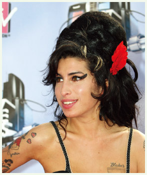 Amy Winehouse was a British singer and songwriter who won numerous awards, including five Grammies in 2008. She struggled for years with addictions to alcohol and drugs, including crack cocaine, heroin, and ecstasy. While trying to wean herself