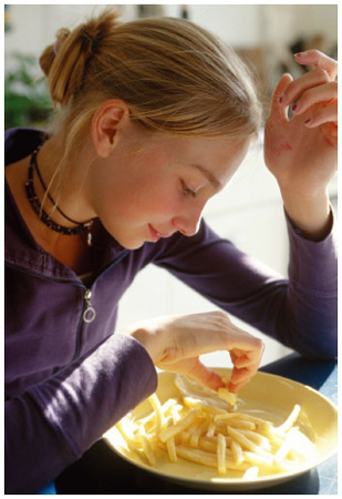 Eating a plate full of French fries is something most teens do occasionally. However, if there is a repeated cycle of binge eating followed by purging, the teen is suffering from bulimia.