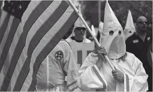 The Ku Klux Klan is an organization that formed in the South after the American Civil War. Its members believe strongly in the superiority of whites over other races.