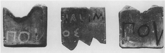 Voting tokens with the name of the deme, or village, an abbreviation of the office, and the name of the tribe
