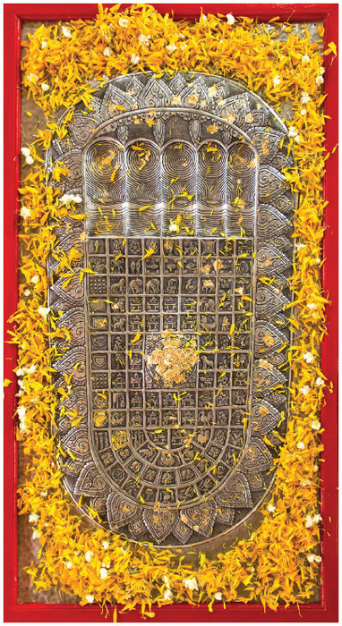 Among Buddhisms symbols is that of the Buddhas footprint, such as this one located in Thailand. The footprints represent both his former physical presence on Earth and his temporal absence.