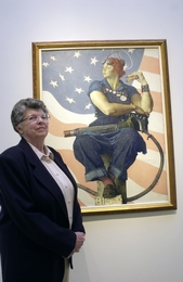 Mary Keefe, Model for Iconic Rosie the Riveter, Stands with Painting